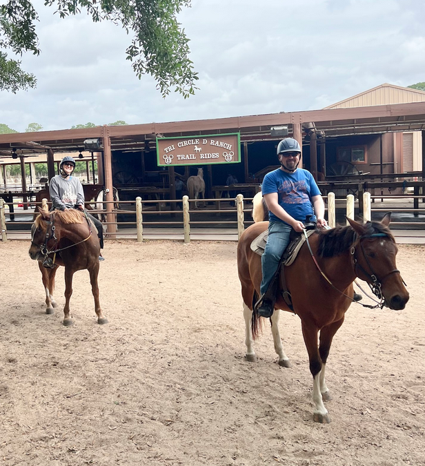 Csilla and James getting ready for a trail ride