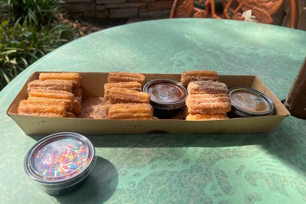 Family Churros with caramel chocolate and sprinkles
