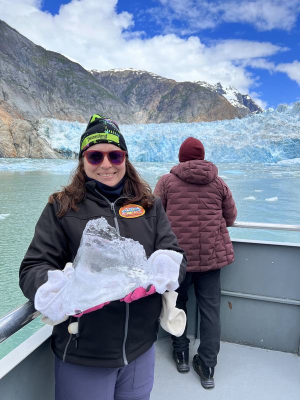 Kati holding glacier ice from the South Sawyer Glacier