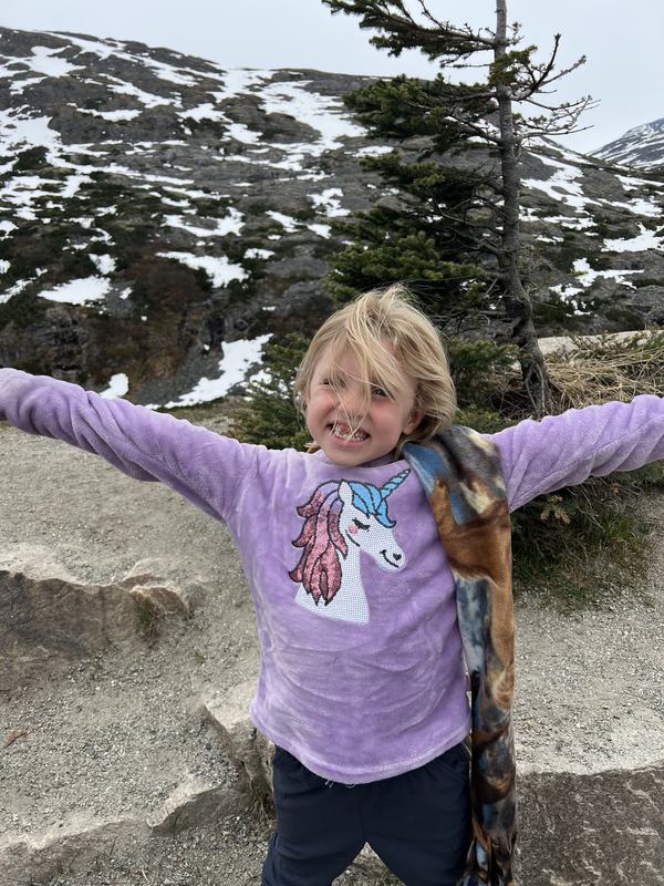 Mia at the lookout point heading to Skagway on top of the mountain
