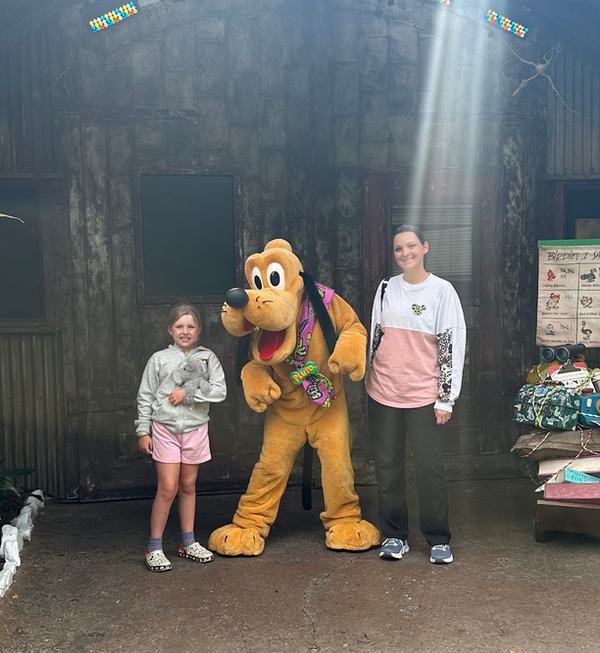 Mia and Csilla with Pluto at Animal Kingdom