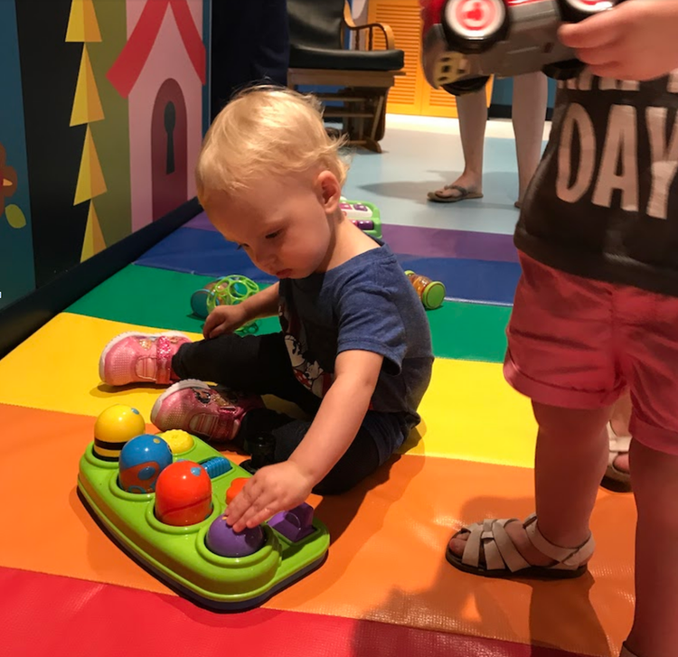 Mia at the "It's a Small World" nursery on the Disney Cruise