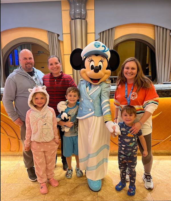Jimmy, Kati, Kristi, Mia, Bennett, and Tavasz with Mickey