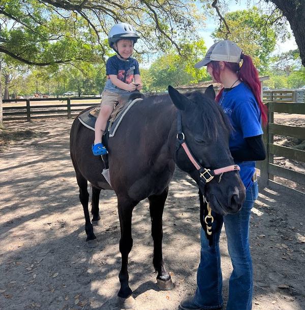 Tavasz on a pony ride at Lawton Stables