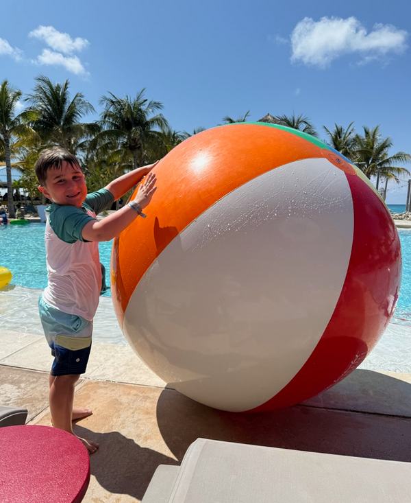 Tav with a mega beach ball at the Bimini Beach Club
