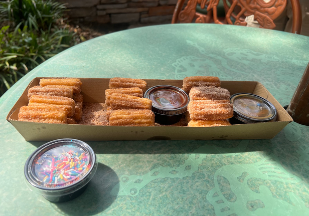 Family Churros with caramel chocolate and sprinkles